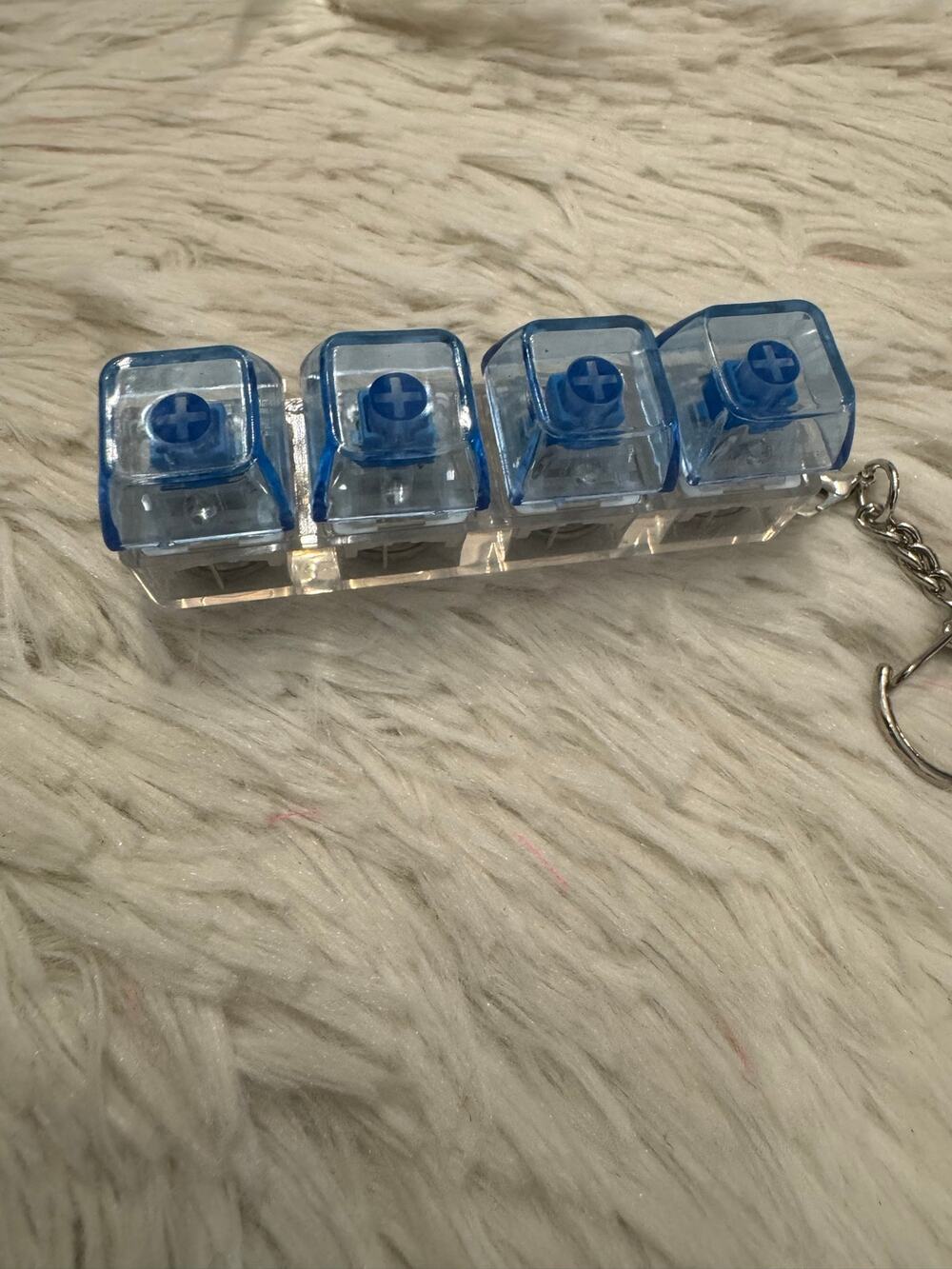 Blue and clear acrylic fidget clicker keychain four blue keycaps with lights